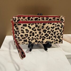 Leopard print wristlet with red trim (possibly Chico)